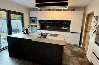 Haus kaufen in 89364 Rettenbach, Vielseitige Immobilien: Modernes Neubauhaus und charmantes Altbauhaus mit zusätzlicher Einliegerwohn