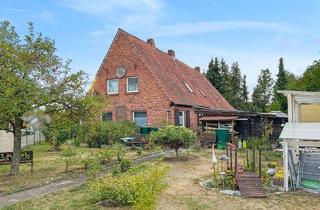 Doppelhaushälfte kaufen in 30900 Wedemark, Doppelhaushälfte mit großzügigem Grundstück und Obstgarten in Wedemark-Abbensen