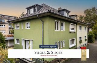 Anlageobjekt in 53840 Troisdorf, Kapitalanlage in Troisdorf: Dreiparteienhaus mit Garagen