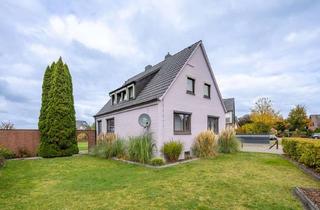 Haus kaufen in 28857 Syke, Siedlungshaus mit Vollkeller & großem Grundstück