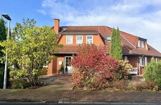 Doppelhaushälfte kaufen in 31628 Landesbergen, Familienidyll mit Stil: große Doppelhaushälfte am Ortsrand mit Garten, Teich und viel Wohnkomfort