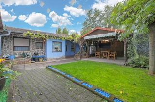 Einfamilienhaus kaufen in 76351 Linkenheim-Hochstetten, Großzügiger Bungalow mit uneinsichtigem Garten – Familienidylle in ruhiger Lage von Hochstetten