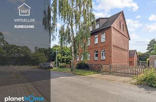 Mehrfamilienhaus kaufen in 30855 Langenhagen, Langenhagen-Godshorn: Vermietetes 3-Parteienhaus mit 8 Garagen