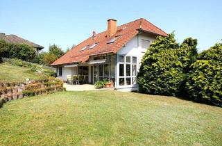 Einfamilienhaus kaufen in 36286 Neuenstein, Neuenstein - Traumhaftes Wohnjuwel mit Praxisanbau und Gartenidylle in Raboldshausen!