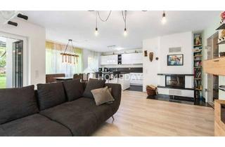 Wohnung kaufen in 65934 Frankfurt, Frankfurt - Neuwertige 4-Zimmer-Gartenwohnung mit Townhouse-Feeling, Kamin und verschließbarem TG-Stellplatz