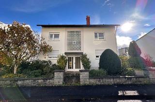 Haus kaufen in 76437 Rastatt, Rastatt - Geräumiges Zweifamilienhaus mit 2 Garagen in Rastatt