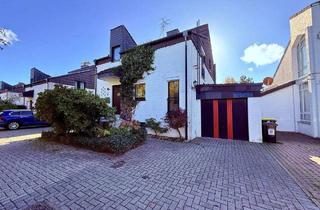 Haus kaufen in 30826 Garbsen, Garbsen - Außergewöhnliches Doppelhaus in Split-Level-Architektur- offene Ebenen, helle Räume und hoher Wohnkomfort