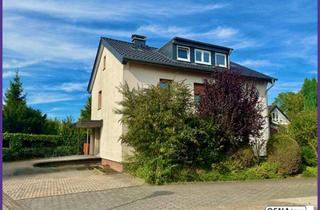 Mehrfamilienhaus kaufen in 49324 Melle, Attraktives saniertes Mehrfamilienhaus mit zusätzlichem Baugrundstück und Baugenehmigung!