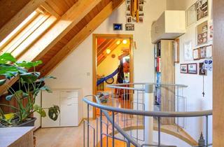 Wohnung kaufen in 72535 Heroldstatt, Charmante Maisonette-Dachgeschosswohnung mit Balkon und Garage in ruhiger Lage von Heroldstatt