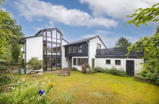 Haus kaufen in 21244 Buchholz, Drei Wohnebenen mit Doppelgarage, Dachterrasse und Keller