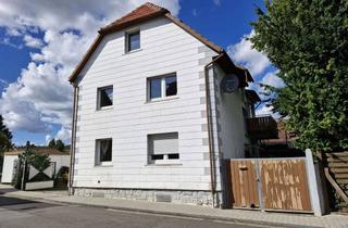Haus kaufen in 64354 Reinheim, Zweifamilienhaus mit Potential in zentraler Lage von Reinheim-Zeilhard