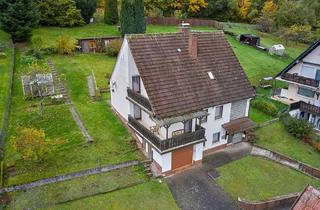 Haus kaufen in 63869 Heigenbrücken, Panoramablick inklusive. Freistehendes Ein- Zweifamilienhaus mit großzügigem Grundstück