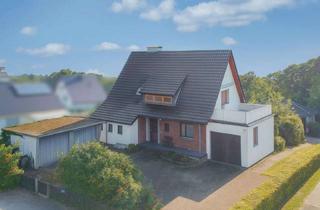 Haus kaufen in 33719 Heepen, Energetisch renoviert & viel Platz: Zweifamilienhaus mit Garagen & Pool in Brönninghausen