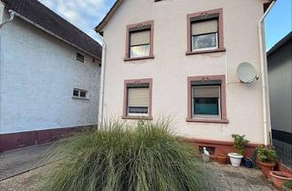 Haus kaufen in 64546 Mörfelden-Walldorf, Charmantes Zweifamilienhaus mit schönem Garten