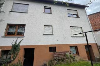 Einfamilienhaus kaufen in 35444 Biebertal, Gut geschnittenes, sanierungsbedürftiges Einfamilienhaus