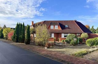 Doppelhaushälfte kaufen in 31628 Landesbergen, Familienfreundliche Doppelhaushälfte mit Garten, Teich und Kamin – ruhig wohnen in Landesbergen