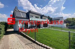 Anlageobjekt in 56626 Andernach, Attraktive Erdgeschoßwohnung mit Terrasse, Balkon und Gartenanteil.