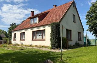 Einfamilienhaus kaufen in 26969 Butjadingen, Ihr Zuhause an der Nordsee - Haus mit großem Grundstück in Tossens