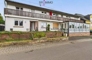 Mehrfamilienhaus kaufen in 54655 Malberg, Malberg - Ehemaliges Hotel mit modernisiertem Wohnkonzept - perfekt für Anleger und Eigennutzer