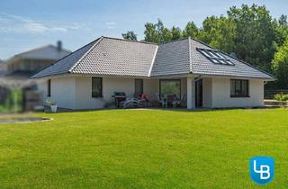 Einfamilienhaus kaufen in 24610 Trappenkamp, Trappenkamp - Neuwertig, elegant und energieeffizient - ein Haus, das Zukunft baut.