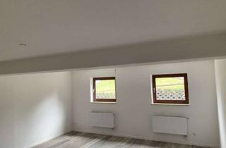 Wohnung kaufen in 78658 Zimmern, Schöne Wohnoase: Große 1,5-Zimmerwohnung mit Stellplatz und Einbauküche