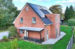 Einfamilienhaus kaufen in 24969 Großenwiehe, Neuwertiges Einfamilienhaus in Sackgassenlage mit Garten und PV-Anlage