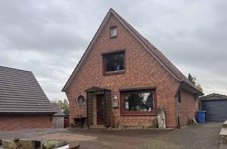 Einfamilienhaus kaufen in 25712 Burg (Dithmarschen), Charmantes Einfamilienhaus in Burg mit großzügigem Grundstück und modernisierter Ausstattung