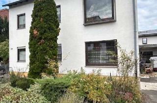 Haus kaufen in 69214 Eppelheim, Vorderhaus und Rückgebäude auf einem großen Grundstück mit Gartenanlage und Garagen