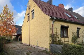 Doppelhaushälfte kaufen in 16909 Wittstock, Charmante Doppelhaushälfte mit großem Grundstück und viel Potenzial in Wittstock/Dosse