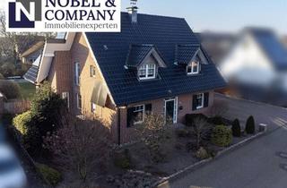 Haus kaufen in 46414 Rhede, Wohnen mit Stil – Traumhaus mit Schwimmteich und Wohlfühlambiente!