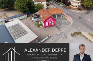 Haus kaufen in Bahnhofstraße 58, 31812 Bad Pyrmont, Vielseitiges Wohn- und Geschäftshaus mit zwei Gewerbeeinheiten, Wohnung und zehn Garagen