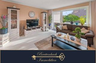 Wohnung kaufen in 26969 Butjadingen, Gepflegte 4-Zimmer-Wohnung mit Balkon und ausgebautem Dachboden