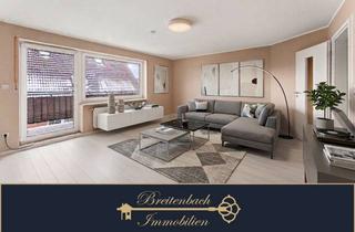 Wohnung kaufen in 26969 Butjadingen, Gepflegte 4-Zimmer-Wohnung mit Balkon und ausgebautem Dachboden