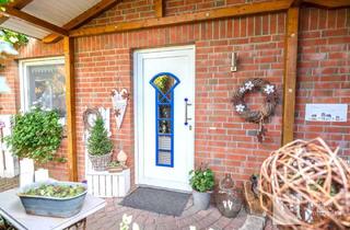 Doppelhaushälfte kaufen in 21382 Brietlingen, Charmante Doppelhaushälfte mit modernem Flair und grünem Gartenparadies