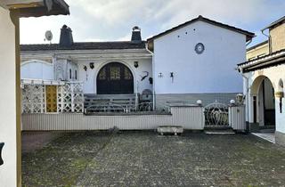 Haus kaufen in 61206 Wöllstadt, Ihr Traum vom Wohnen in Nieder-Wöllstadt – Ein Grundstück voller Möglichkeiten!