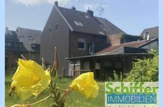 Haus kaufen in 41363 Jüchen, Haus mit viel Wohnfläche und großem Garten wartet auf kreative Handwerker