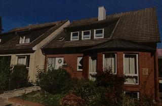 Haus kaufen in 49124 Georgsmarienhütte, Georgsmarienhütte - Zweifamilienhaus in ruhiger Lage von Georgsmarienhütte-Holzhausen