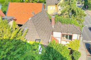 Haus kaufen in 61476 Kronberg, Kronberg im Taunus - Besonderes Fachwerkhaus mit Potential