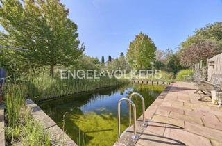 Haus kaufen in 67354 Römerberg, Idyllisches Wohnerlebnis mit zwei Häusern, Naturschwimmteich und nachhaltiger Technik!