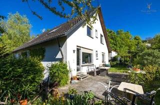 Mehrfamilienhaus kaufen in 97080 Grombühl, Attraktives Mehrfamilienhaus mit drei Wohneinheiten und großem Grundstück in Würzburg-Grombühl