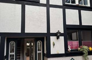 Haus kaufen in Holzweg 21a, 53424 Remagen, Charmantes Fachwerkhaus mit Einliegerwohnung und Sonnenterrasse in Remagen-Oberwinter