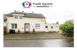 Einfamilienhaus kaufen in 54576 Hillesheim, Einfamilienhaus mit Garage und Werkstatt - 3 Schlafzimmer & 2 Badezimmer - Pelletofen