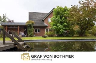Haus kaufen in 27389 Lauenbrück, Familienglück mit Schwimmteich – wo Wohnen zur Erholung wird