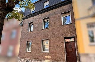 Haus kaufen in 52223 Stolberg, Zweifamilienhaus mit Garage und Garten in Stolberg-Büsbach