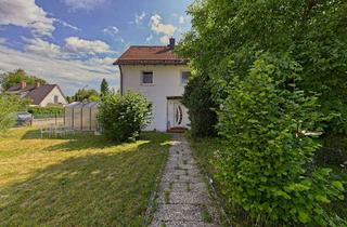 Doppelhaushälfte kaufen in 82538 Geretsried, Charmante Doppelhaushälfte in ruhiger Lage von Geretsried -Viel Potential auf großzügigem Grundstück