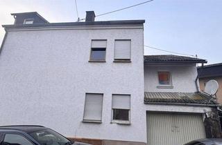Doppelhaushälfte kaufen in 56412 Boden, Günstiges Eigenheim, ideal für Handwerker: Doppelhaushälfte mit Garage und Hof