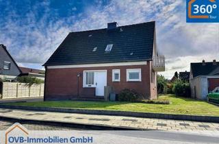 Einfamilienhaus kaufen in 26802 Moormerland, Einfamilienhaus mit Einliegerwohnung und Garage