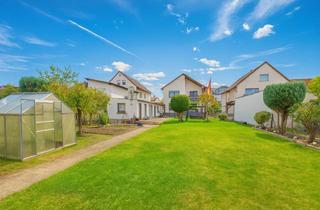 Haus kaufen in 64546 Mörfelden-Walldorf, Charmantes 2-Familienhaus mit zusätzlichem Baugrundstück – vielseitige Nutzungsmöglichkeiten!