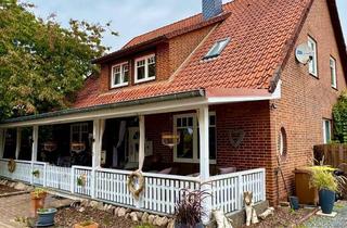 Haus kaufen in 27254 Staffhorst, Gepflegtes Zweifamilienhaus in zentraler Ortslage von Staffhorst – Pferdeboxen und Weidemöglichkeit!