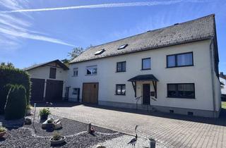 Haus kaufen in 56290 Dommershausen, Zweifamilienhaus mit herrlichem Garten, großer Garage und viel Platz in Dommershausen-Dorweiler!